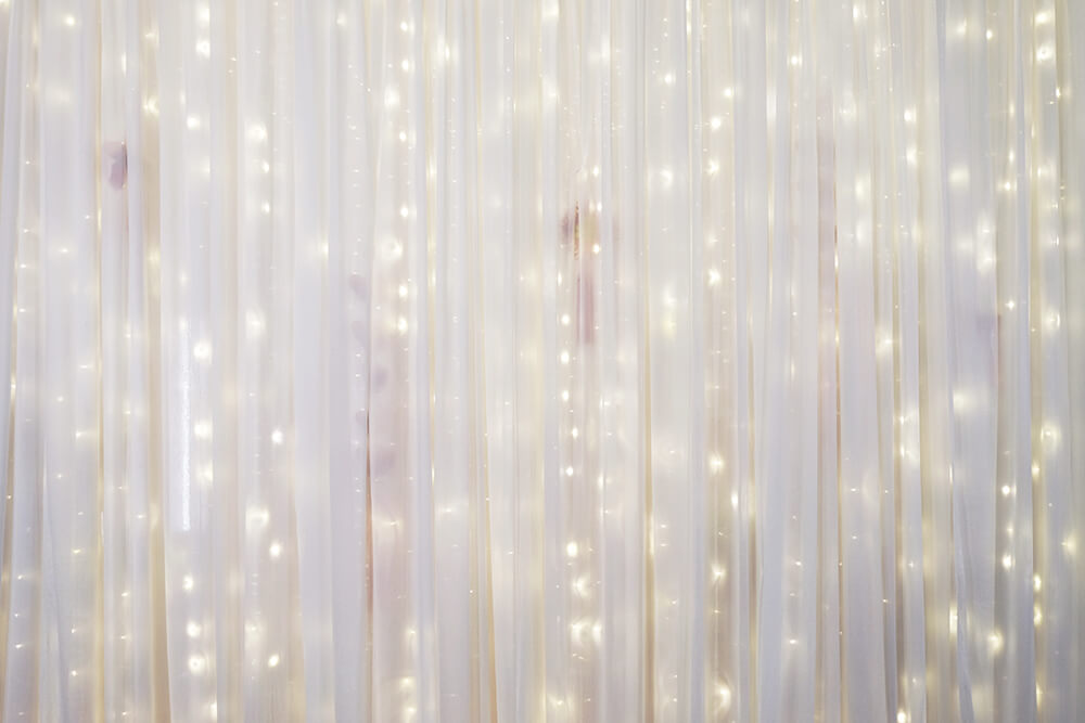 Fairy lights behind curtain DIY